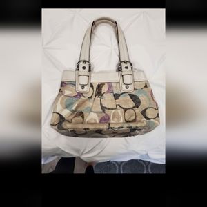 Cream with color Coach purse